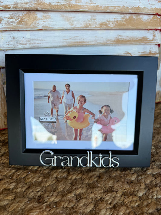 Black bevel frame by Ivy's Gifts & Boutique for 4x6 or 5x7 photos, showcasing a sleek photo display with a modern design.