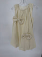 Ivory Bubble Hem Dress with Bow Accents by Ivy's Gifts & Boutique, featuring a stylish and feminine design.