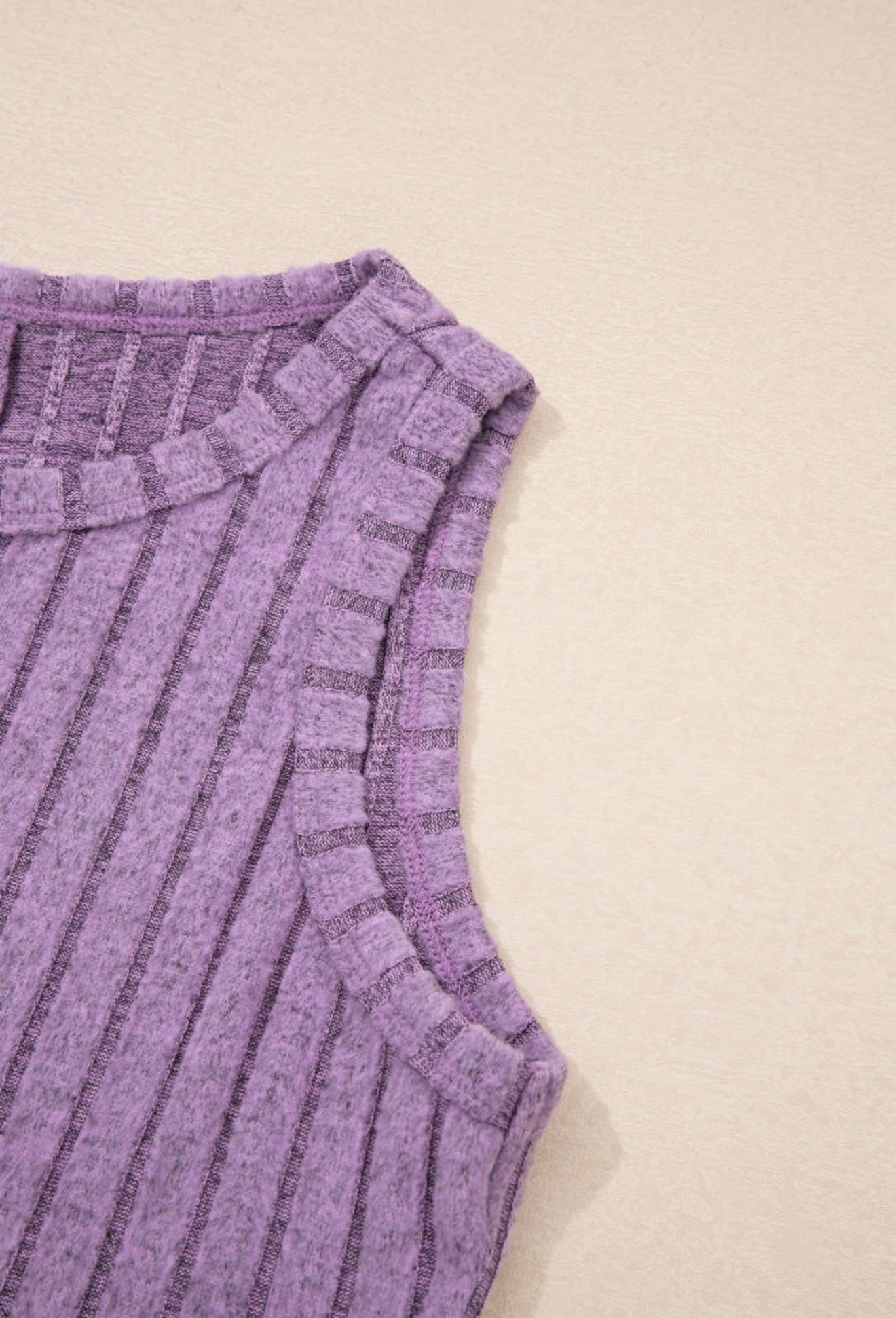Lilac sleeveless ribbed top from Ivy's Gifts & Boutique, featuring a soft, fitted design with a round neckline.