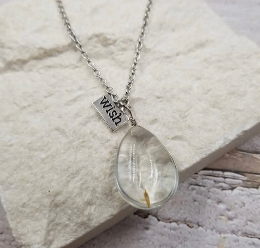 Wish Dandelion necklace with charm detail by Ivy's Gifts & Boutique, featuring a delicate pendant on a fine chain