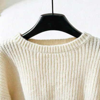 Ivory long puff sleeve sweater with accent bows at the wrists, stylish knit top from Ivy's Gifts & Boutique.