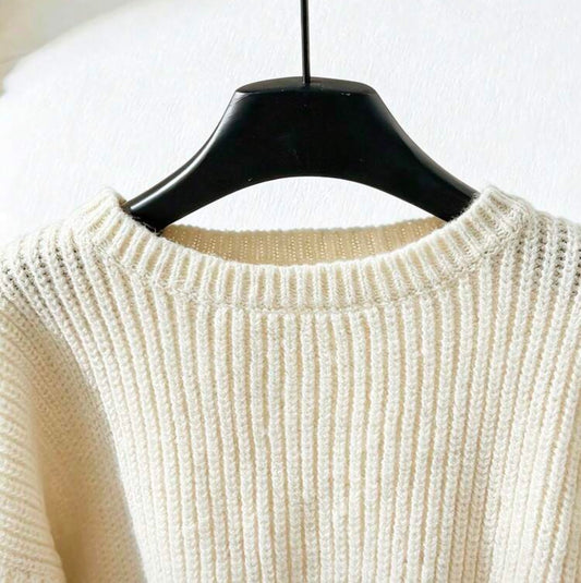 Ivory long puff sleeve sweater with accent bows at the wrists, stylish knit top from Ivy's Gifts & Boutique.