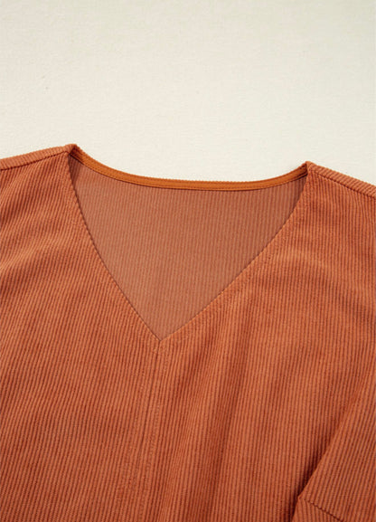 Sleeveless Rust colored dress with Accent Stitched Pocket Design