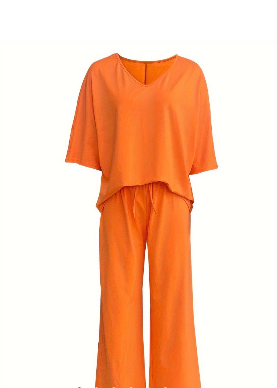 Orange bat wing style 2-piece set by Ivy's Gifts & Boutique, featuring a flowing fabric design with bat wing sleeves.
