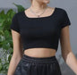 A119 casual crop top by Ivy's Gifts & Boutique, featuring a trendy, fitted design with short sleeves and a scoop neckline.