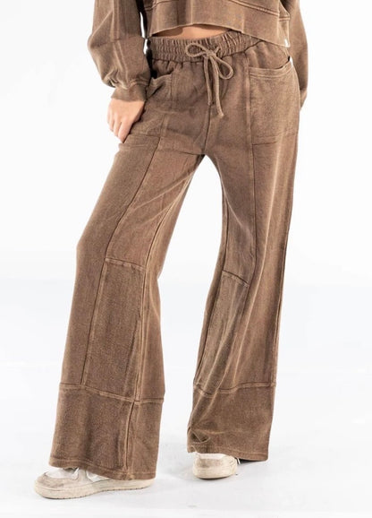 Brown washed panel pants and cropped snap sweatshirt top by Ivy's Gifts & Boutique, casual and comfortable fashion outfit.