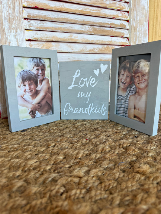 Ivy's Gifts & Boutique GKTF Love My Grandkids tri-fold photo frame displaying family photos with a heartfelt message.