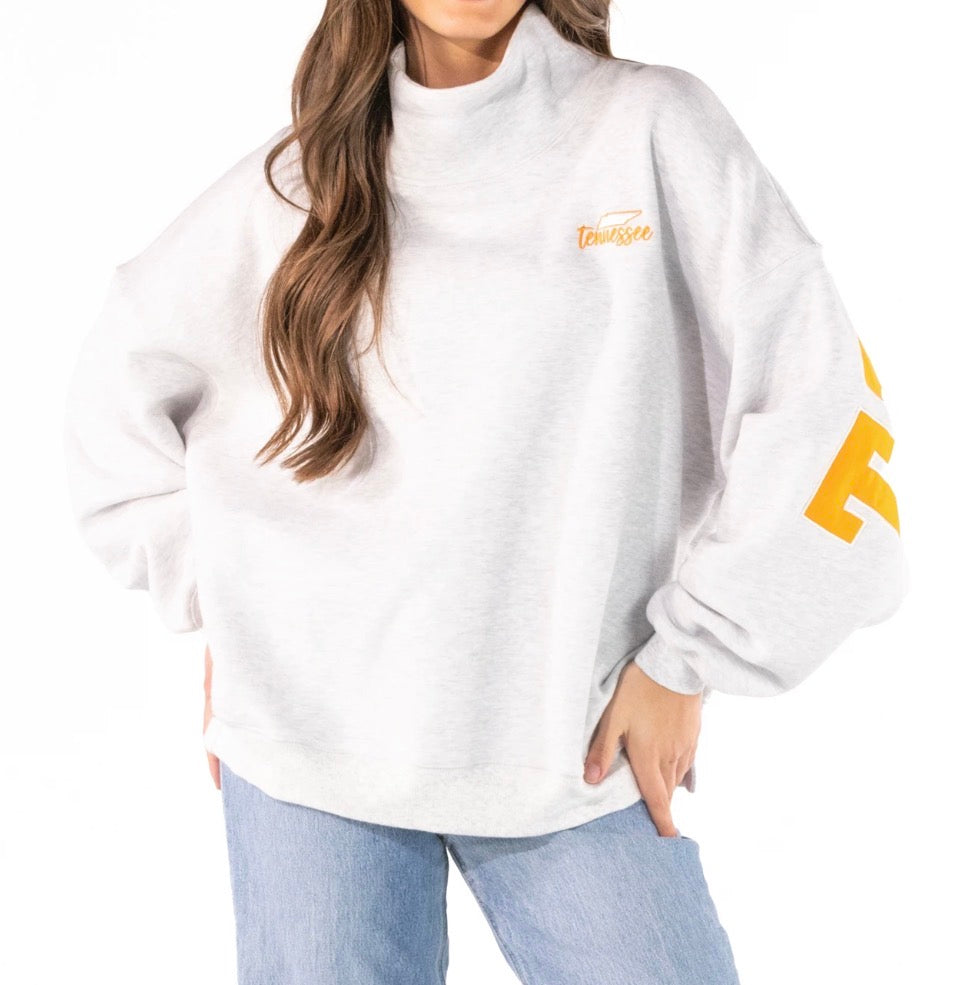 Ivy's Gifts & Boutique SSTN Tennessee mock turtle neck sweatshirt in soft fabric, displayed on a hanger with a neutral background.