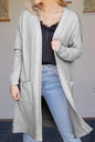 Long casual open front cardigan by Ivy's Gifts & Boutique featuring patch pockets in a soft, comfortable knit fabric