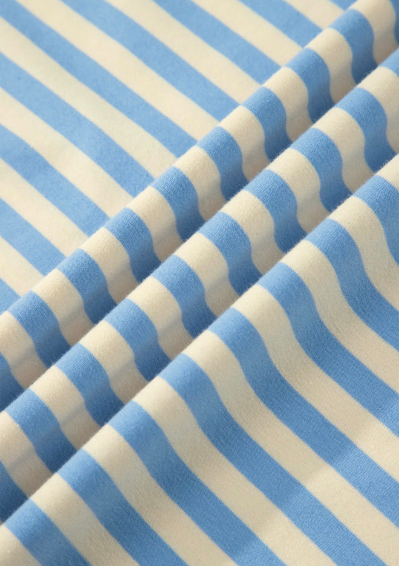 Sky blue drop shoulder stripe top with baby pink contrast trim around the neck, by Ivy's Gifts & Boutique.