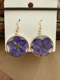 Purple dried flower acrylic disc earrings with gold-tone accents, stylish statement jewelry by Ivy's Gifts & Boutique.