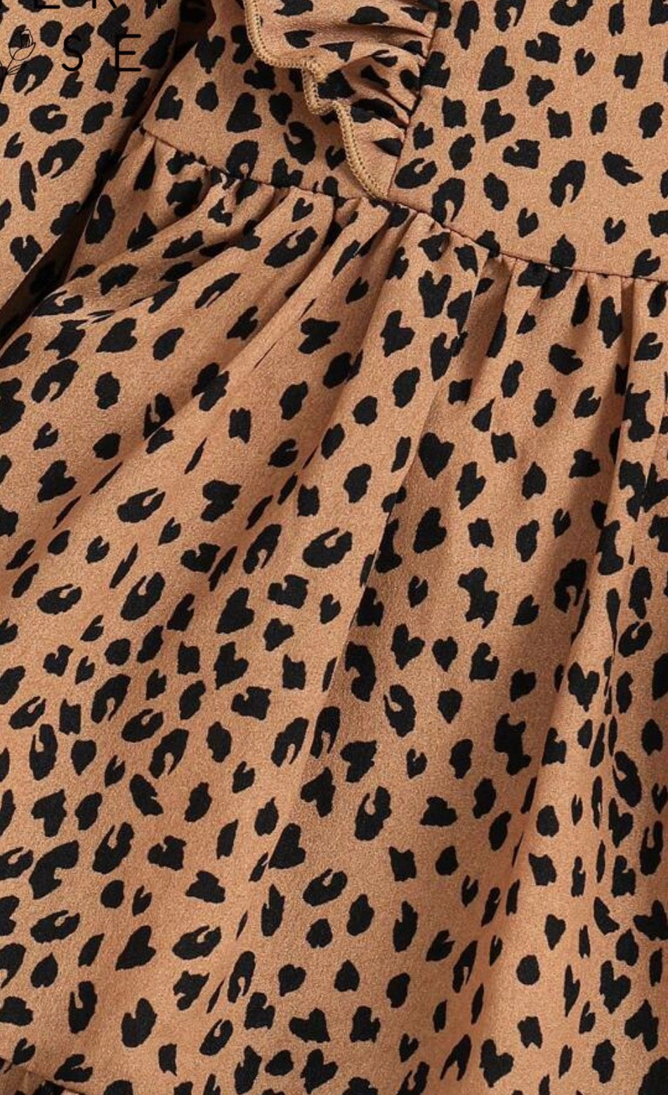 Animal print long sleeve dress by Ivy's Gifts & Boutique with ruffle details on shoulders and hem, stylish and comfortable for any occasion.