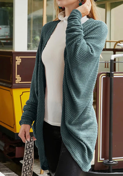 Textured fabric open front cardigan with dolman sleeves from Ivy's Gifts & Boutique, shown on a neutral background.