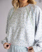 Floral cropped long sleeve top by Ivy's Gifts & Boutique featuring a vibrant floral print and fitted design.