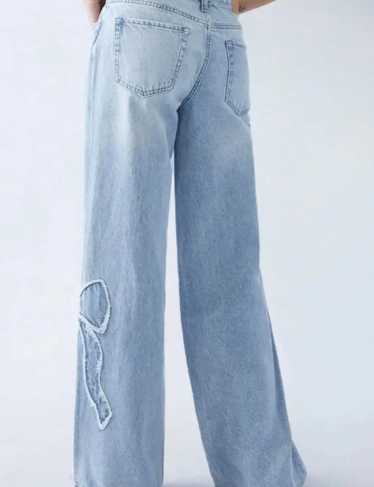 BJF Light Denim Jeans with Frayed Edge Bow Accents