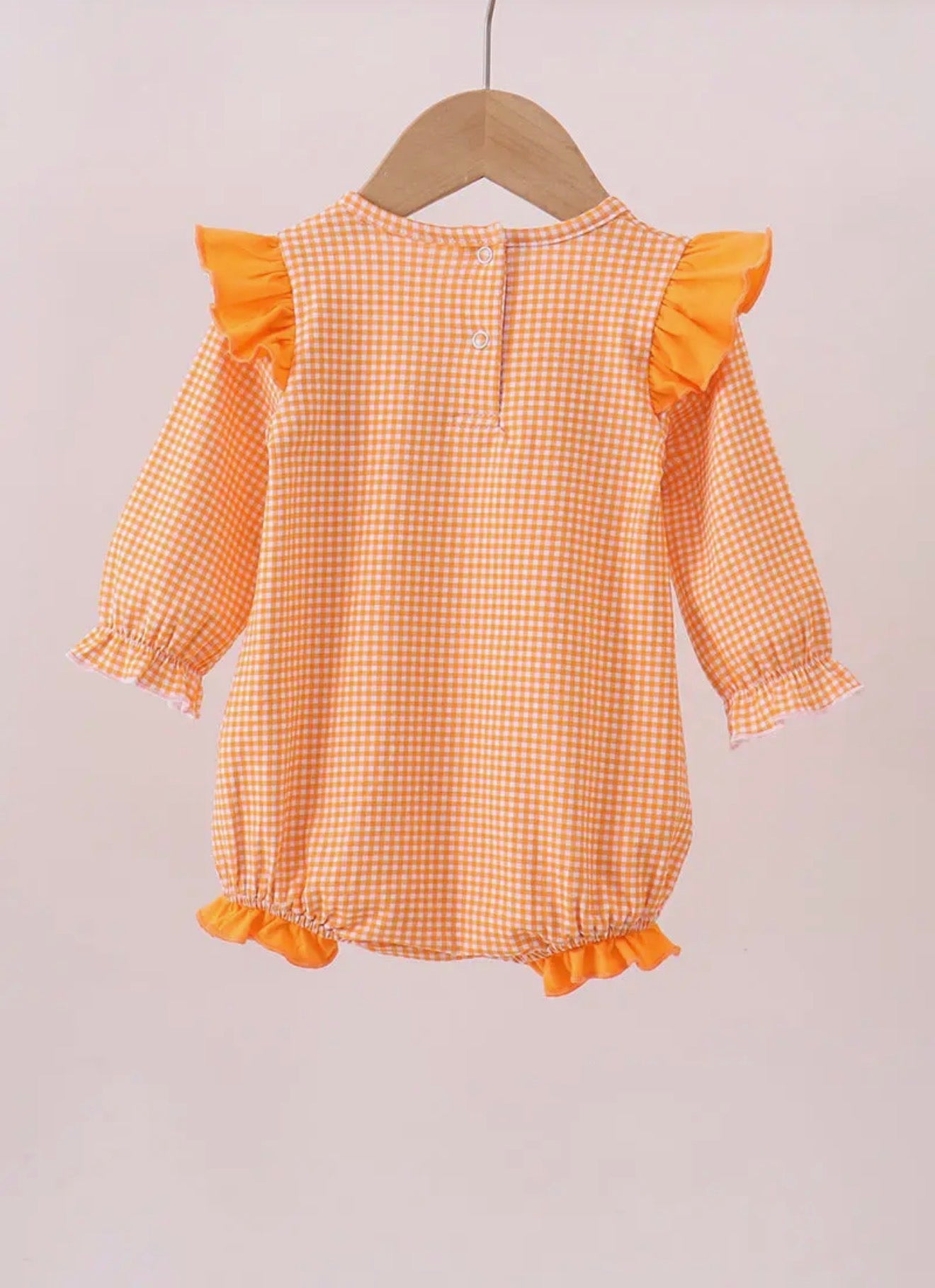 Long sleeve orange and white gingham bubble with embroidery by Ivy's Gifts & Boutique, featuring a comfortable nursery design.