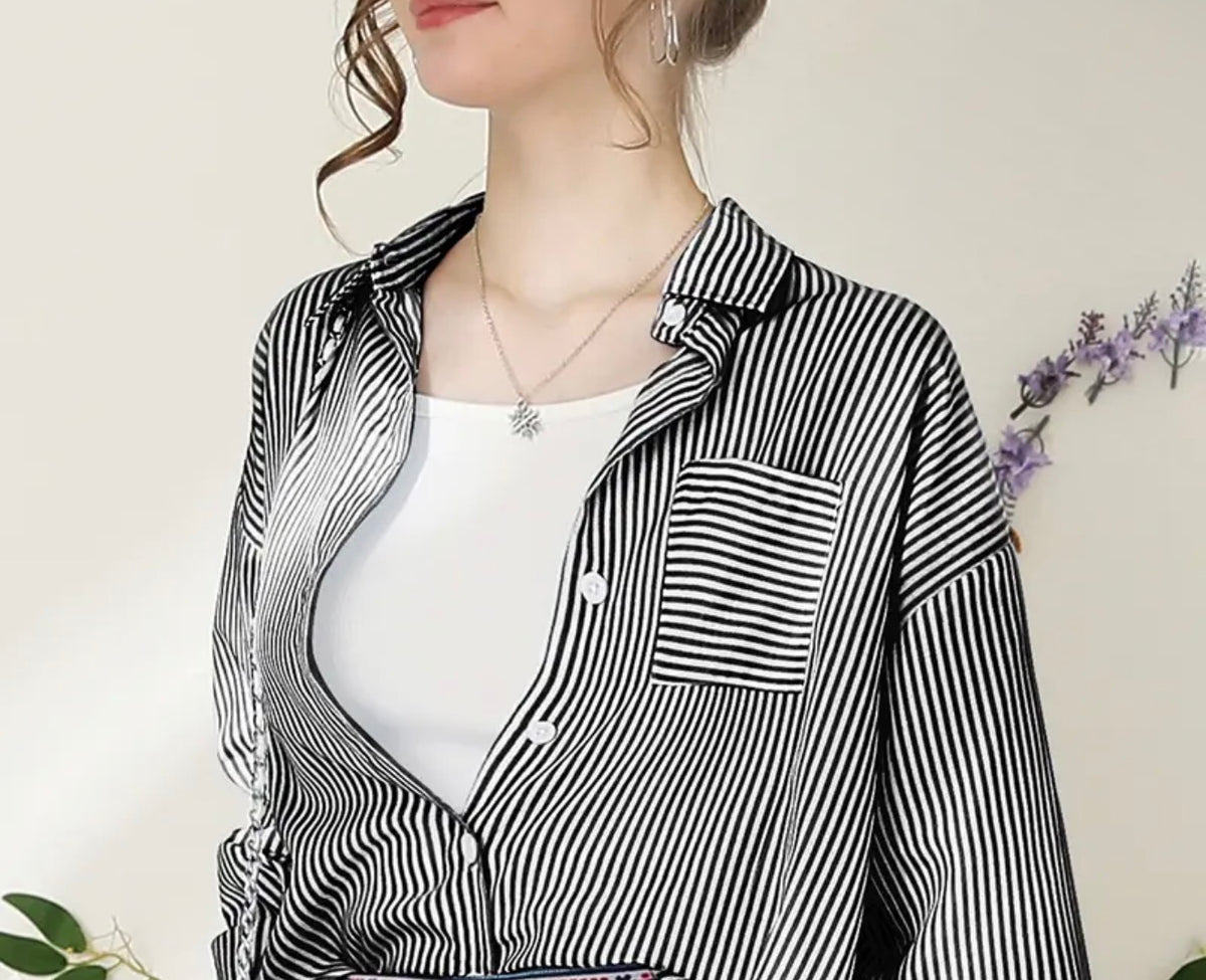 Black stripe button-down blouse by Ivy's Gifts & Boutique, featuring classic style and versatile design for various outfits.
