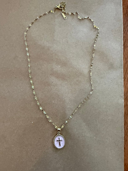 Enamel cross necklace from Ivy's Gifts & Boutique featuring a colorful Christian pendant on a silver chain.