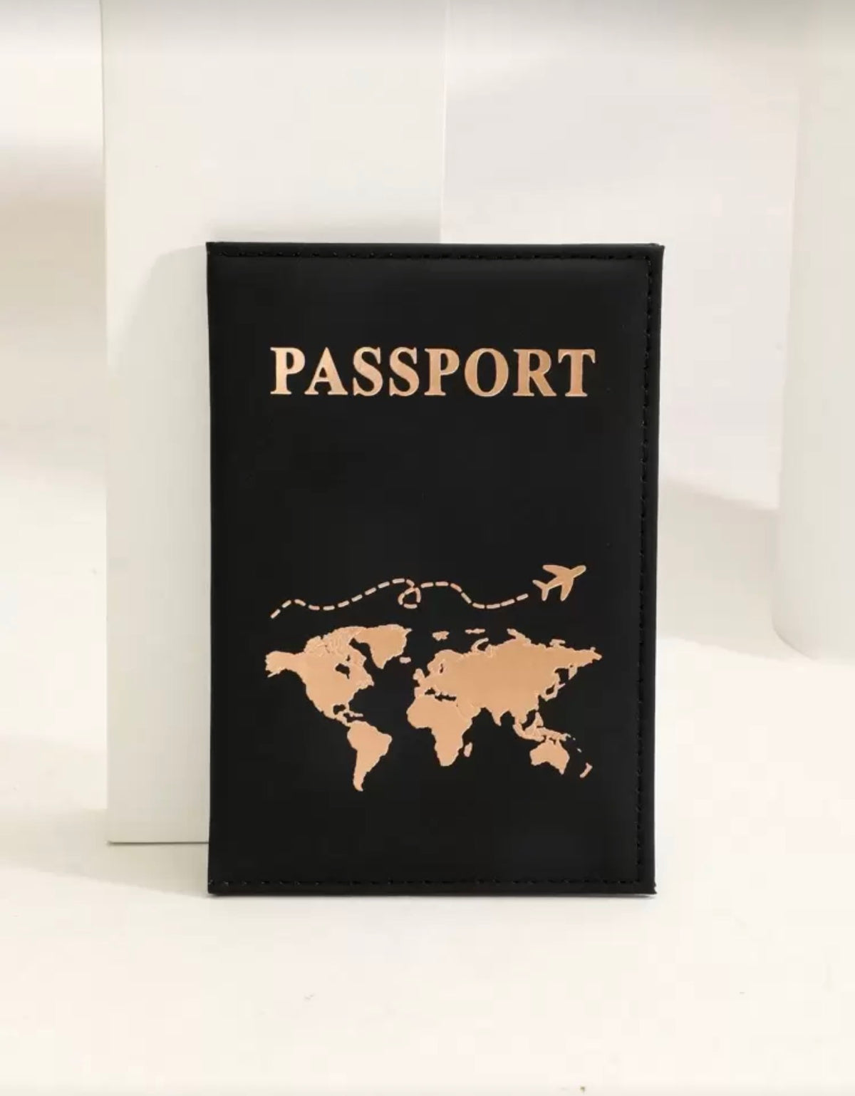 Leather J41 Passport Cover case by Ivy's Gifts & Boutique with stitched edges and a sleek, minimalist design for travel protection.