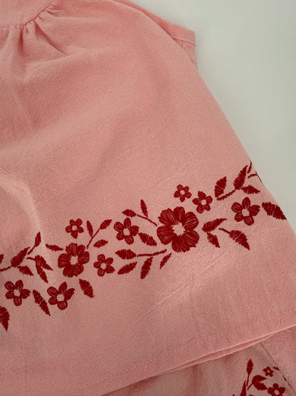 Pink crinkle fabric short set with red floral accents from Ivy's Gifts & Boutique, featuring a two-piece design.