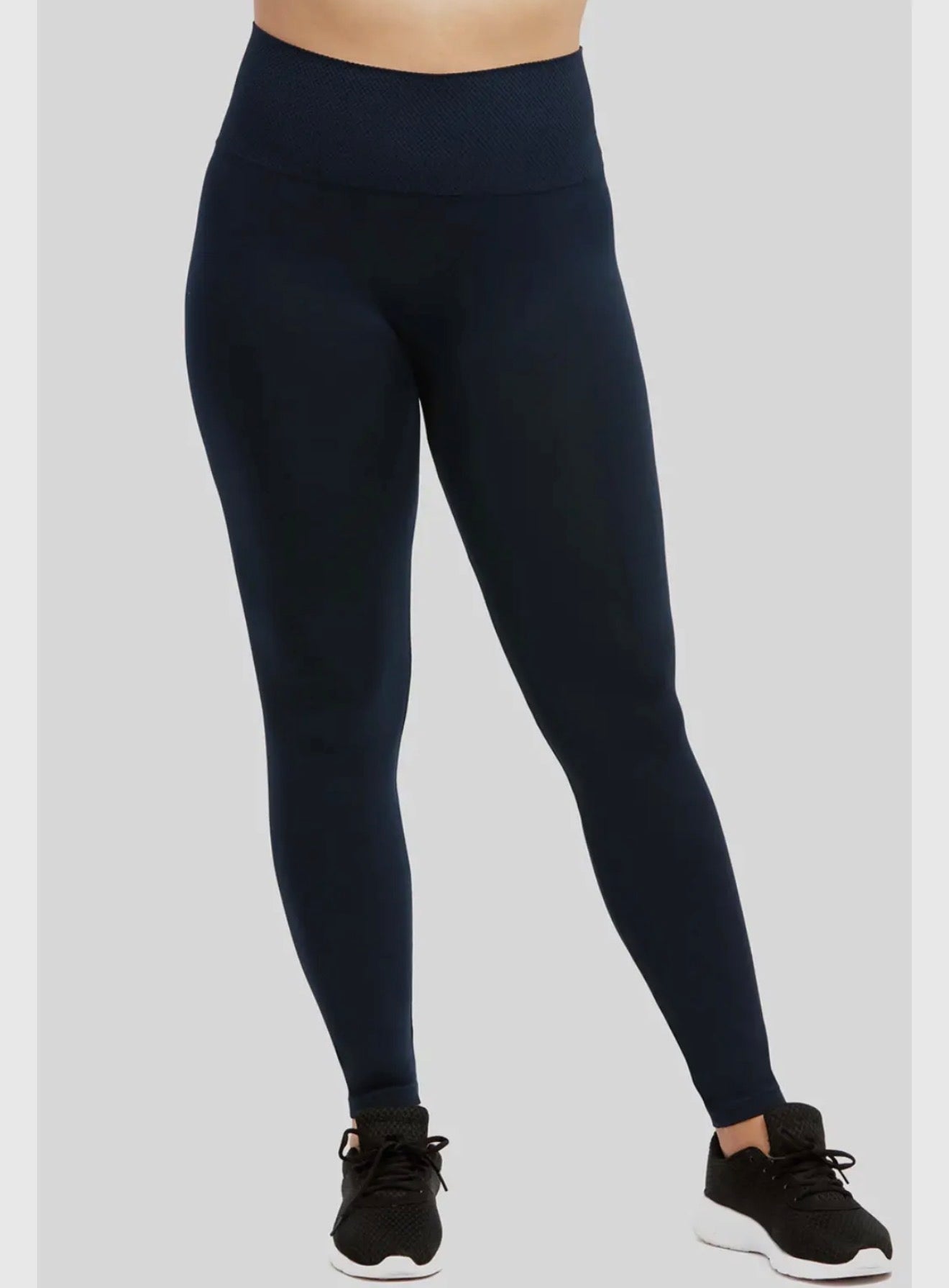 Plus size navy leggings with a wide waistband, featuring soft fabric and a comfortable fit, by Ivy's Gifts & Boutique.