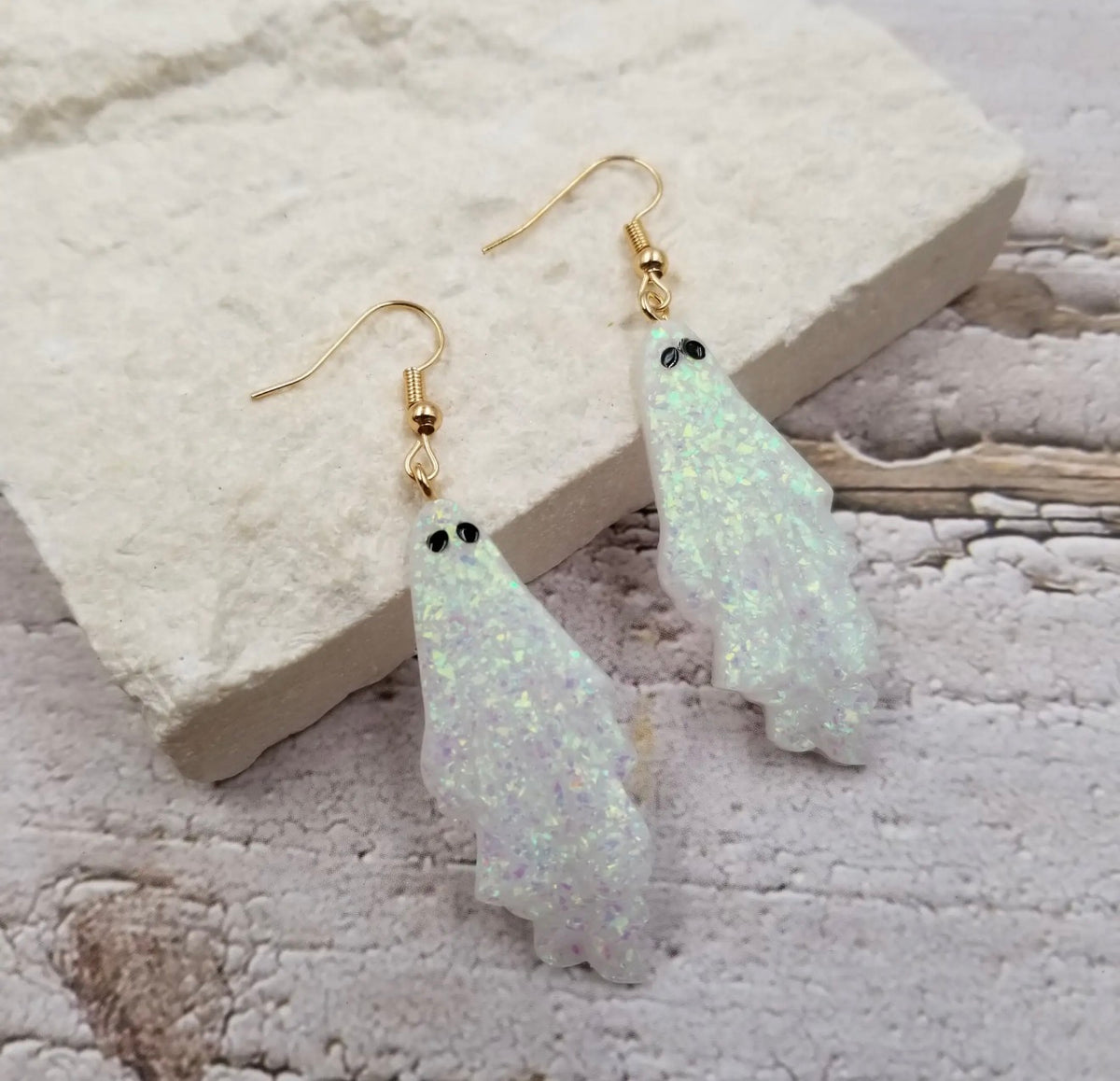 Lightweight acrylic ghost earrings from Ivy's Gifts & Boutique, featuring fun, spooky design perfect for stylish accessories.