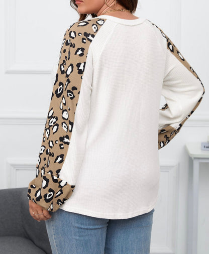 White top w/ animal print long sleeves