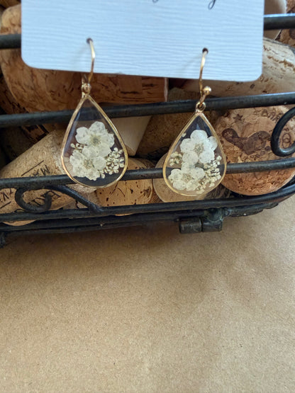 Dried flower earrings with delicate floral design, crafted by Ivy's Gifts & Boutique, featuring natural dried flowers on lightweight earrings.