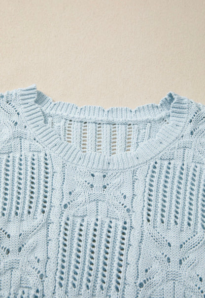 Light blue summer sweater with side tie accents from Ivy's Gifts & Boutique, featuring a relaxed fit and casual style.