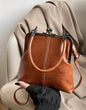 Camel Brown Kiss Clasp Purse