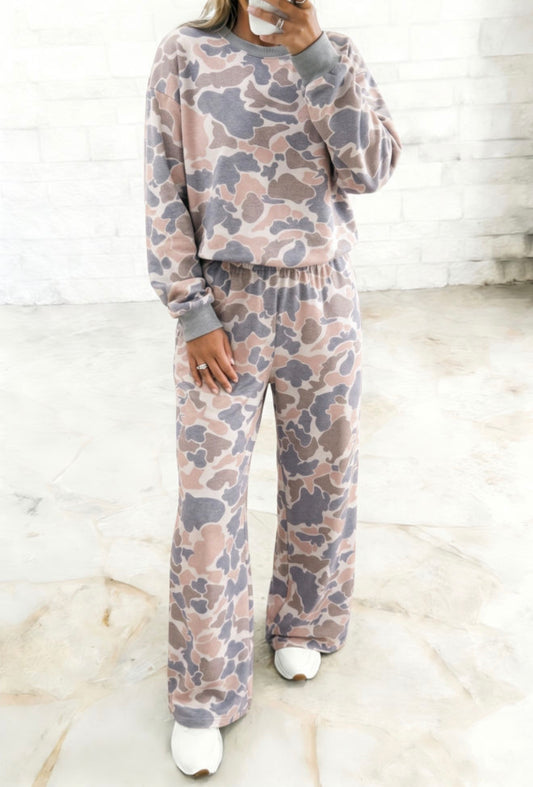 Modern camo print 2-piece set from Ivy's Gifts & Boutique featuring stylish camouflage design and comfortable matching top and pants.