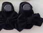 Baby's navy blue BT1 infant gripper sock with adorable toe bow embellishment by Ivy's Gifts & Boutique