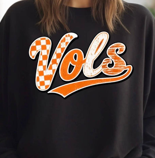 Black VOLS sweatshirt by Ivy's Gifts & Boutique, featuring a comfortable fit and stylish design, shown on a model.