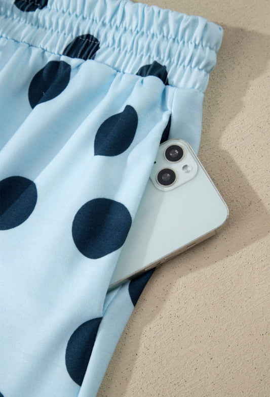Light blue polka dot 2-piece short set for kids by Ivy's Gifts & Boutique, featuring a top and matching shorts.