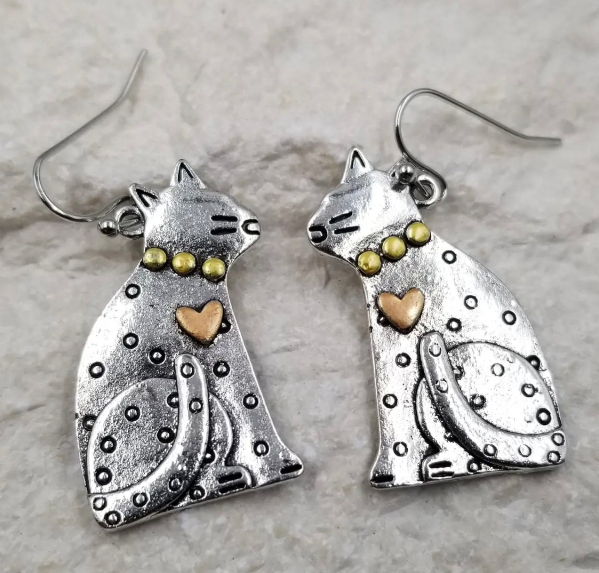 Silver cat earrings with mixed metal heart accents from Ivy's Gifts & Boutique, showcasing cute feline jewelry design.