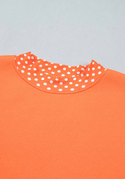 MLOPD Orange Long Sleeve Top with Polka Dot Accented Hem and Sleeve Trim