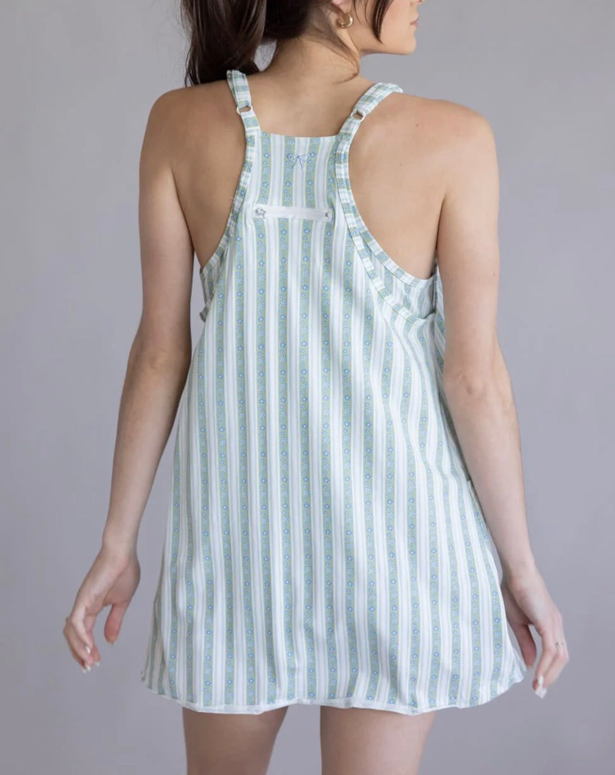 Floral print all-in-one romper from Ivy's Gifts & Boutique, featuring vibrant blossoms and a comfortable, stylish fit.