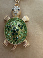 Green rhinestone turtle key ring bag charm featuring a detailed turtle design, perfect for accessorizing bags or keys.