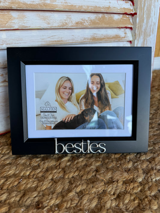Black bevel edge photo frame by Ivy's Gifts & Boutique, fits 4x6 or 5x7 images with a sleek, modern design.
