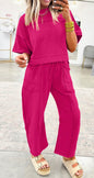 Deep pink dropped shoulder cropped top and comfy elastic waist pants with pockets from Ivy's Gifts & Boutique.