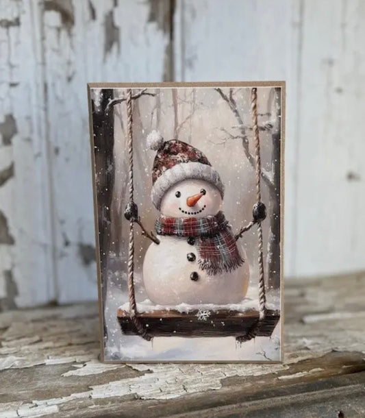 Snowman on Swing