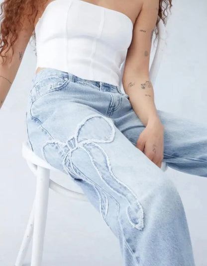 BJF Light Denim Jeans with Frayed Edge Bow Accents