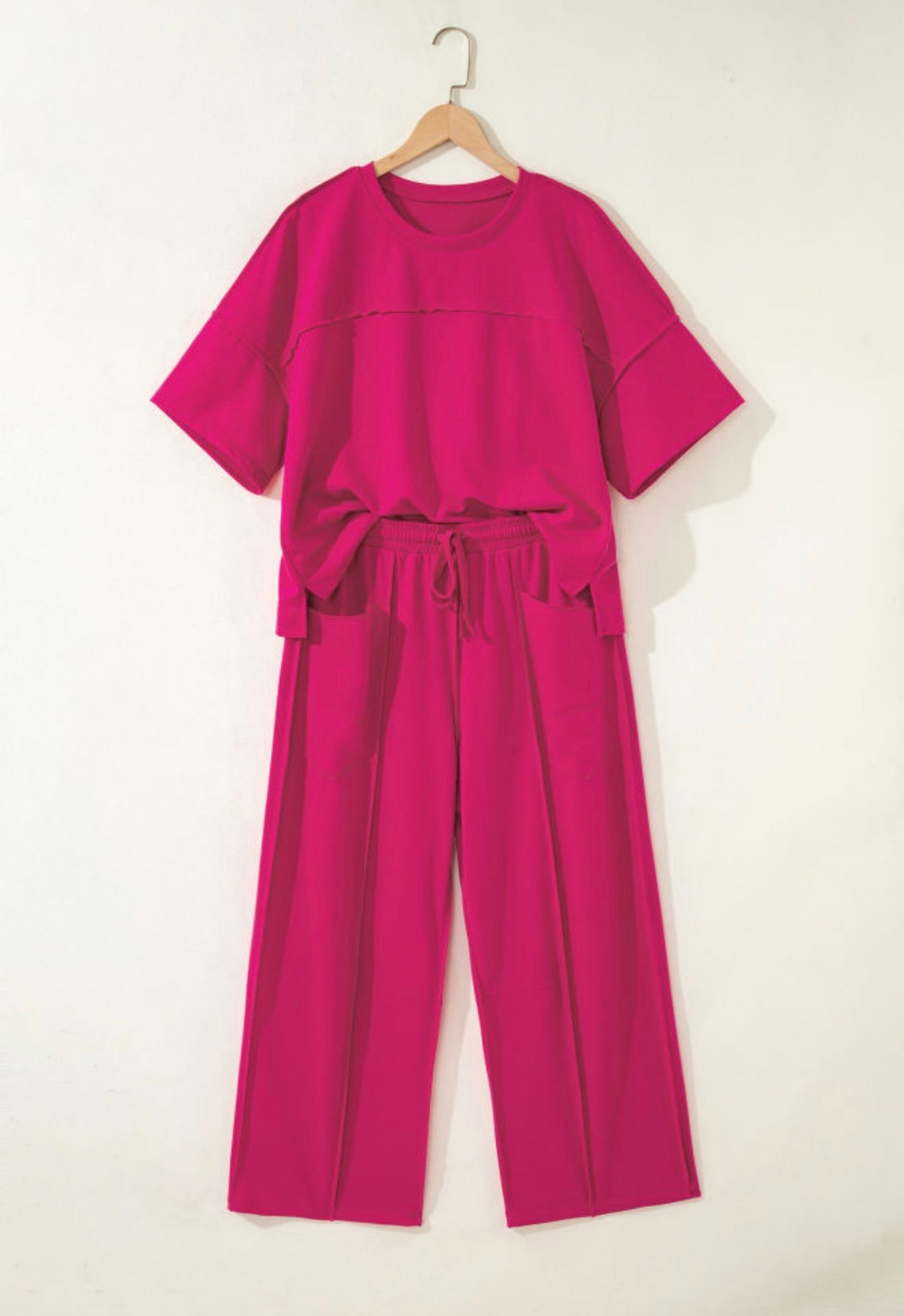 Deep pink dropped shoulder boxy cropped top and elastic waist comfy pants with pockets from Ivy's Gifts & Boutique.