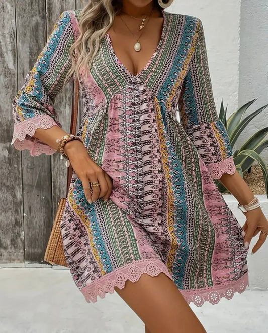 Boho chic V-neck lace trim dress by Ivy's Gifts & Boutique, full-length view showcasing flowing fabric and intricate lace details.