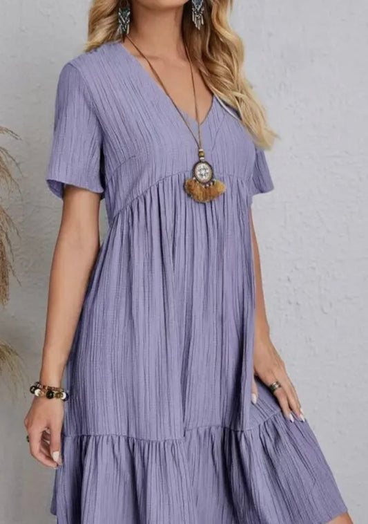 Boho A123 V-neck ruffle hem dress by Ivy's Gifts & Boutique, featuring flowy fabric and ruffle details in a stylish design