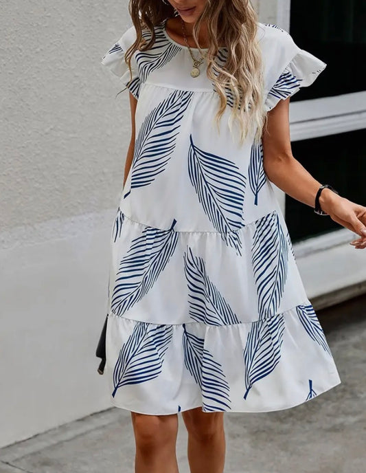 A94 Leaf Print Dress by Ivy's Gifts & Boutique featuring a vibrant leaf pattern and a flattering silhouette for women.