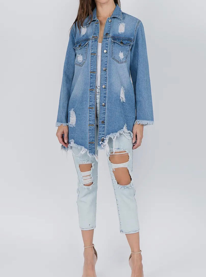 A90 distressed denim shirt-style jacket from Ivy's Gifts & Boutique with a relaxed fit and stylish worn-in look.