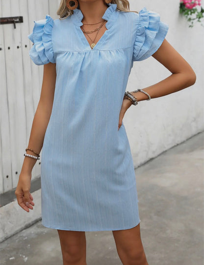 A124 Solid Princess Ruffle Sleeve Mini Dress by Ivy's Gifts & Boutique, featuring a fitted silhouette and ruffle sleeve details.