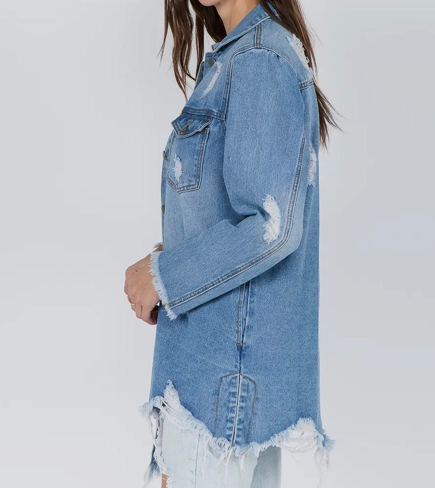 Distressed denim shirt style jacket from Ivy's Gifts & Boutique, featuring a relaxed fit and classic button-down design.