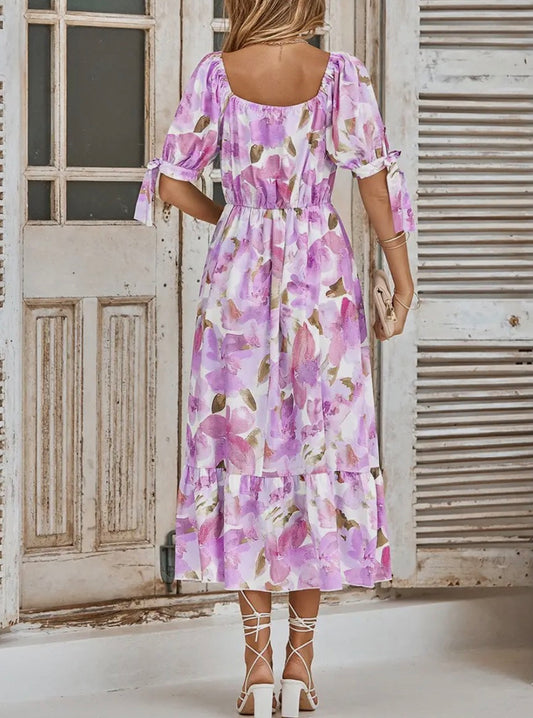 A95 purple pink floral print dress featuring a flowy design and vibrant colors, perfect for spring and summer outings.